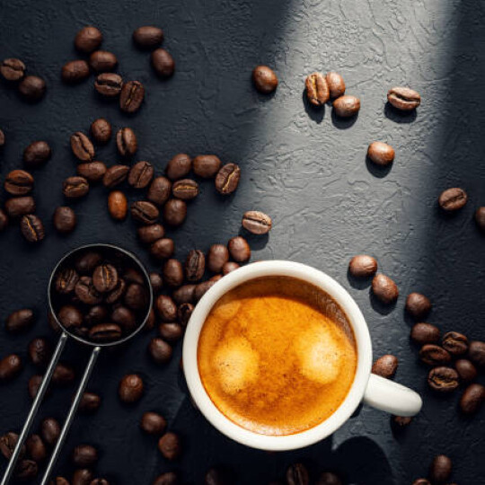 Coffee cup and beans